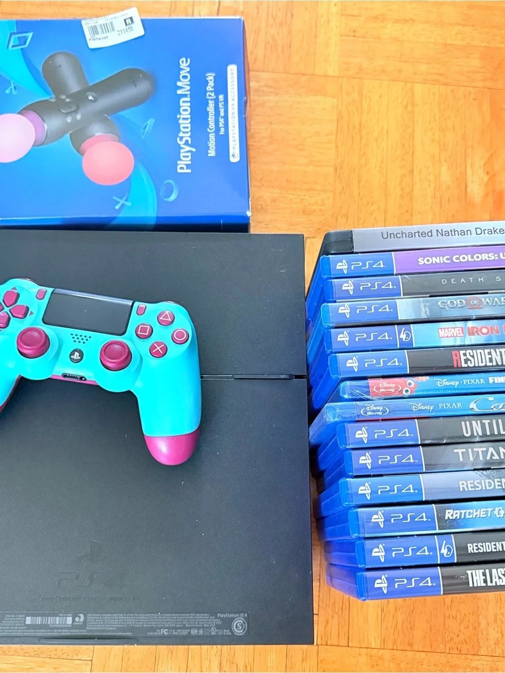 Sony PS4 Console with Turquoise & Pink DualShock Controller and Game Bundle